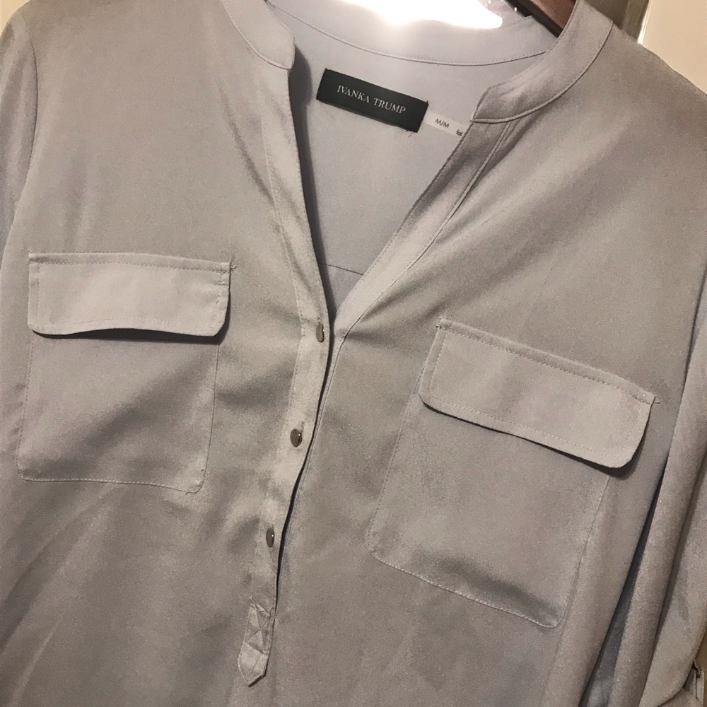 Light blue 3/4 length sleeve blouse.